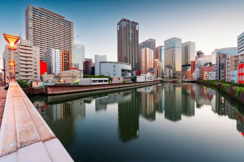 Osaka, Japan Cityscape On The River At Dusk