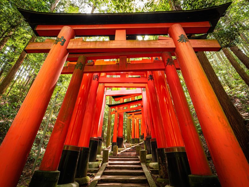 Red Torii Gates In Fushimi Inari Shrine In Kyoto, Japan