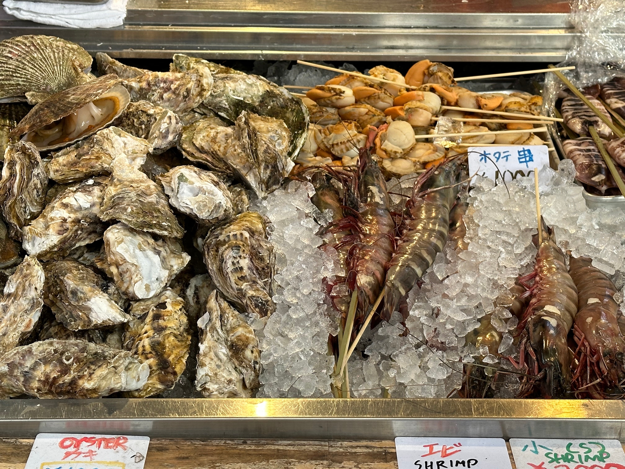 5 Day Tokyo & Mount Fuji Private Tour Package - Tsukiji, Tokyo, Japan - January 24 2024: Fresh Seafood, Including Large Shrimp On Sale At Tsukiji Outer Market. Late Morning.