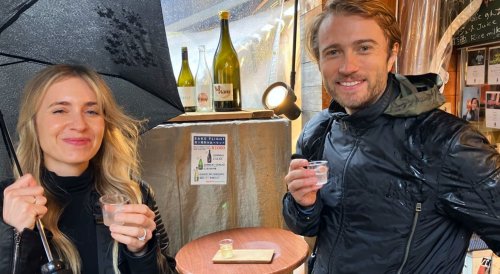 Budget Japan Tour Package Young Couple Enjoying Saki Young Travelers Backpacking In Japan